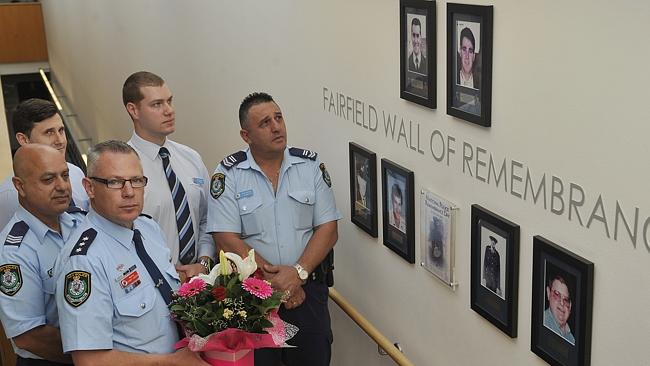 Friday was the 17th anniversary of the murder of David Carty. Fairfield police officers held a minute's silence at the station’s Wall of Remembrance. Picture: Tim Clapin