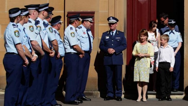 http://www.smh.com.au/nsw/david-rixon-murder-michael-jacobs-gets-life-in-jail-20131004-2uz2l.html NSW Police Commissioner Andrew Scipione after the sentencing at Darlinghurst Courts with Fiona Rixon, (and family) wife of Senior Constable David Rixon and his colleagues from Oxley LAC. Photo: Dallas Kilponen