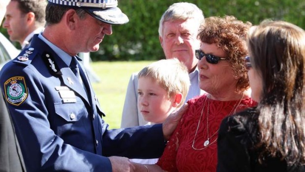 http://www.smh.com.au/nsw/david-rixon-murder-michael-jacobs-gets-life-in-jail-20131004-2uz2l.html NSW Police Commissioner Andrew Scipione with a family member after the sentencing at Darlinghurst Courts. Senior Constable David Rixon was killed while on duty. Photo: Dallas Kilponen