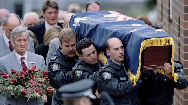 http://www.dailytelegraph.com.au/news/crescent-heads-police-killings-two-decades-on-ceremony-will-mark-sacrifice-made-by-senior-constables-on-duty/story-fni0cx4q-1227433992584 Police carry the coffin of Senior Constable Peter Addison.