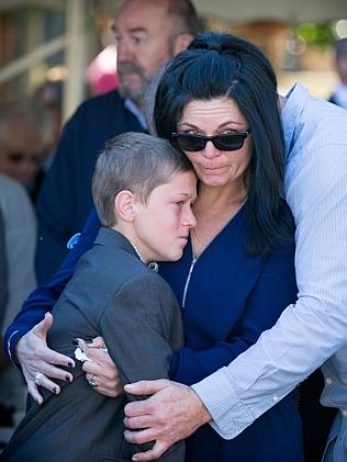 Jade Spears with her son and husband Glenn Addison at Crescent Head. Picture: Lindsay Moller
