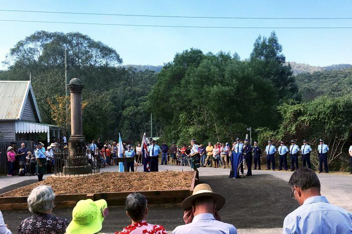 http://www.abc.net.au/news/2016-05-03/nerrigundah-clarke-gang-ogrady-bushranger-shootout/7379516 NSW Police conduct a flag ceremony on the 150th anniversary of the shootout in which Constable Miles O'Grady was murdered at Nerrigundah. (ABC: Bill Brown)