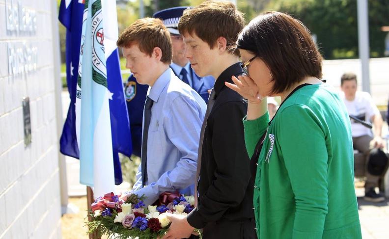 http://www.illawarramercury.com.au/story/2591540/lake-illawarra-officers-honoured-on-police-remembrance-day-photos/#slide=10 Family members lay a wreath for Robert Edwin Brotherson. Picture: ANDY ZAKELI<br />