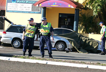 The scene... where two off-duty police officers were struck by a car on the NSW mid-north coast today.
