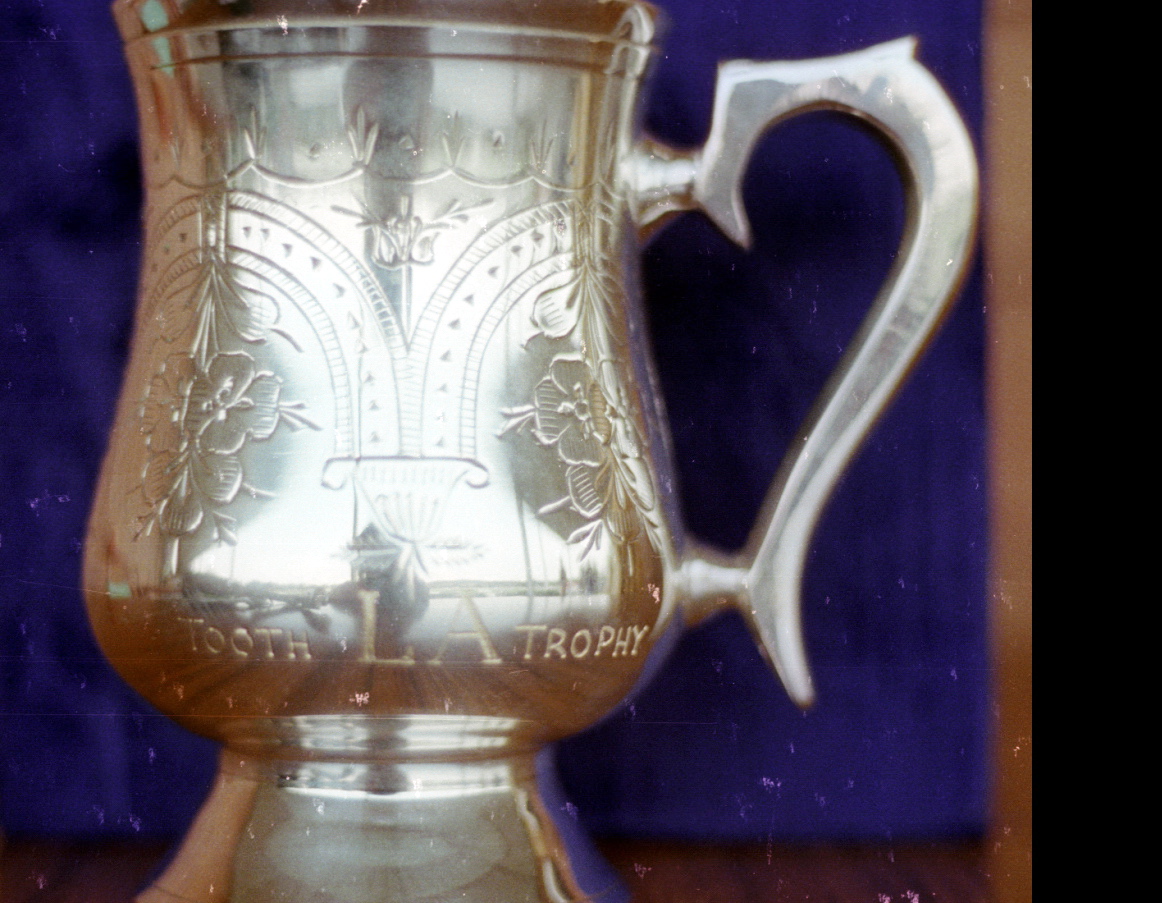 POLICE FOOTBALL. CONSTABLE PAT CARNEY, FROM WOLLONGONG POLICE, RECEIVED THE TOOTH L.A. MAN OF THE MATCH TROPHY IN THE DRESSING SHED OF LYSAGHTS FOOTBALL FIELD, FIGTREE. (PAT COMMITTED SUICIDE 10 NOVEMBER 2003. HE WAS A CIVILLIAN AT THAT TIME) 13 APRIL 1983