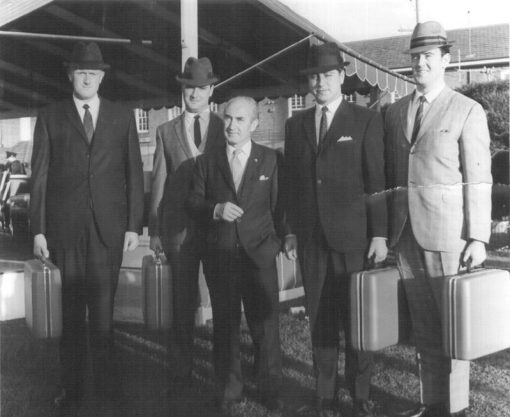 Jane McMahon Janne McMahon: <br /> I found this photo going through my old files. It was taken at my Passing Out Parade on 23/6/1969. It shows <a href="https://police.freom.com/adrian-athol-allingham/" target="_blank" rel="noopener noreferrer"><strong>Adrian Allingham</strong></a> (R.I.P.), Dennis Gilligan, <a href="https://police.freom.com/aldo-lorenzutta/" target="_blank" rel="noopener noreferrer"><strong>Aldo Lorenzutta</strong></a> (RIP) and Bruce Smith. They all won portable Olivetti typewriters as part of the Transfield trophy for topping the Detectives Course in 1968 & 1969. The little bloke without the hat was from Transfield. Bruce Smith presented his typewriter to the Detective Training Unit in 2010. Their names appear at the top of the honour board.