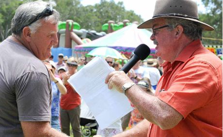 Phil Jacobson is congratulated by Coffs Harbour City Council Mayor Cr Keith Rhoades after being named Sawtellian of the Year.
