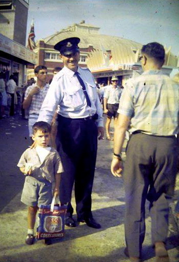 Ronald Ivan Blunt at the Royal Easter Show, Sydney with a lost child in the late 50's early 60's.