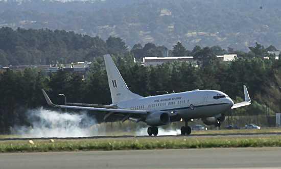 The RAAF jet carrying Adam Dunning's body touches down. Photo: Andrew Taylor