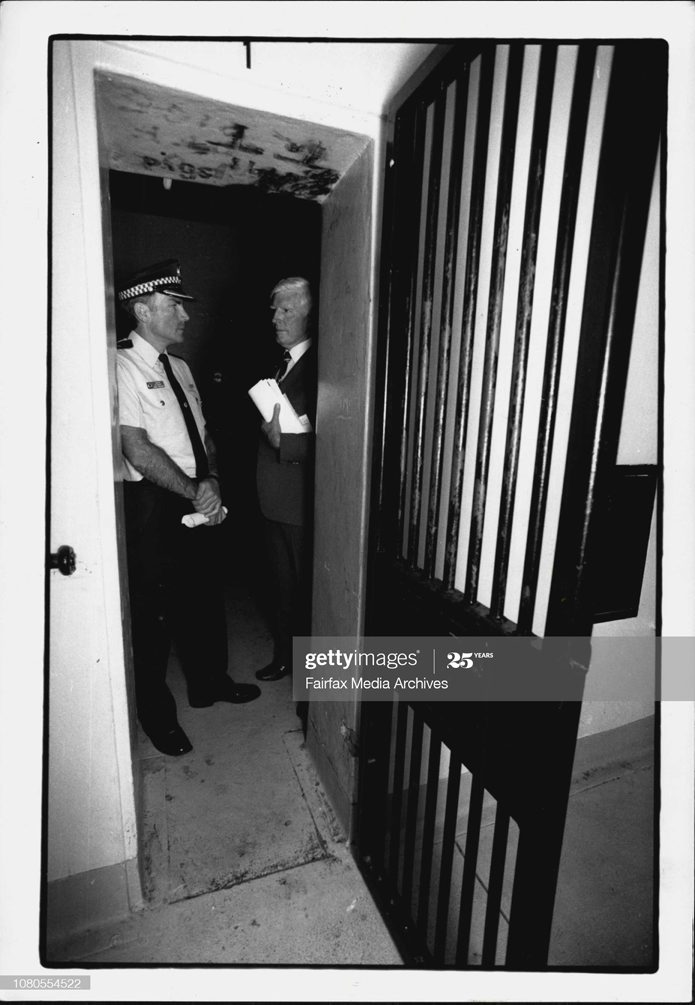Deputy Commissioner & State Commander Lance Stirton (Right) & Acting Patrol Commissioner Sid Walsh (left) (Newtown) inspect Newtown Police station cells which apparently don't comply to the Geneva convention.Senior officers inspect the Newtown police cells.The NSW Commander of Police, Deputy Commissioner Lance Stirton, responded to the labelling of Newtown police station cells as ââ¬Åutterly disgracefulââ¬Â by walking into the cells yesterday and agreeing.Standing in one of the cold, dank cells, Mr Stirton said: ââ¬ÅWe just have to take this one on the chin.ââ¬Â The Ombudsman, Mr. Landa, said in his annual report that prisoners were being kept in conditions that did not meet the minimum standard in the Prison Act. He said some cells contravened the Geneva Convention for prisoners of war. November 15, 1991. (Photo by Alexander James Towle/Fairfax Media via Getty Images). Lance STIRTON. Deputy Commissioner & State Commander Lance Stirton (Right) & Acting Patrol Commissioner Sid Walsh (left) (Newtown) inspect Newtown Police station cells which apparently don't comply to the Geneva convention.Senior officers inspect the Newtown police cells.The NSW Commander of Police, Deputy Commissioner Lance Stirton, responded to the labelling of Newtown police station cells as ââ¬Åutterly disgracefulââ¬Â by walking into the cells yesterday and agreeing.Standing in one of the cold, dank cells, Mr Stirton said: ââ¬ÅWe just have to take this one on the chin.ââ¬Â The Ombudsman, Mr. Landa, said in his annual report that prisoners were being kept in conditions that did not meet the minimum standard in the Prison Act. He said some cells contravened the Geneva Convention for prisoners of war. November 15, 1991. (Photo by Alexander James Towle/Fairfax Media via Getty Images).