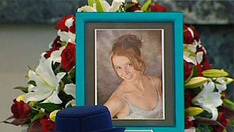 http://www.dailytelegraph.com.au/news/nsw/policeman-lays-true-love-to-rest/story-e6freuzi-1111116202529 rue love ... a photograph of policewoman Elise Krejci adorns her coffin. Picture: Channel 9