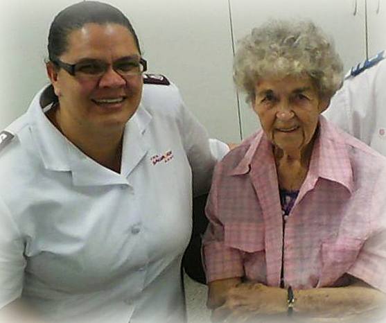 Olive Corcoran - widow of Ron, mother to Graeme ( with a Salvation Army Corp member )