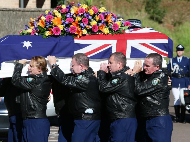 http://www.dailytelegraph.com.au/newslocal/central-coast/tributes-flow-for-courageous-lung-cancer-victim-sergeant-tara-mclaughlin/news-story/73290762d9f1aa178b04b90422ab8548 Police pallbearers carry the casket of Senior Constable Tara Tobin, during the funeral held at Our Lady Star of the Sea Church, Terrigal. Picture:Peter Clark