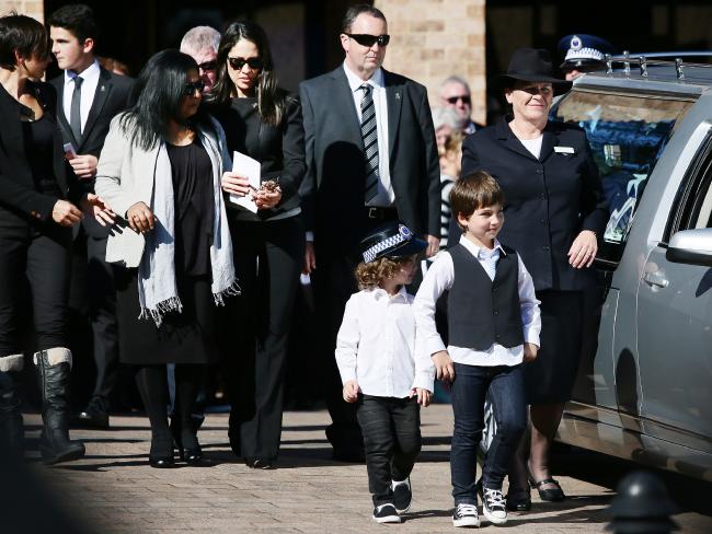 http://www.dailytelegraph.com.au/newslocal/central-coast/tributes-flow-for-courageous-lung-cancer-victim-sergeant-tara-mclaughlin/news-story/73290762d9f1aa178b04b90422ab8548 Family members farewell Sergeant Tara McLaughlin (Tobin), during her funeral held at Our Lady Star of the Sea Church, Terrigal. Picture:Peter Clark