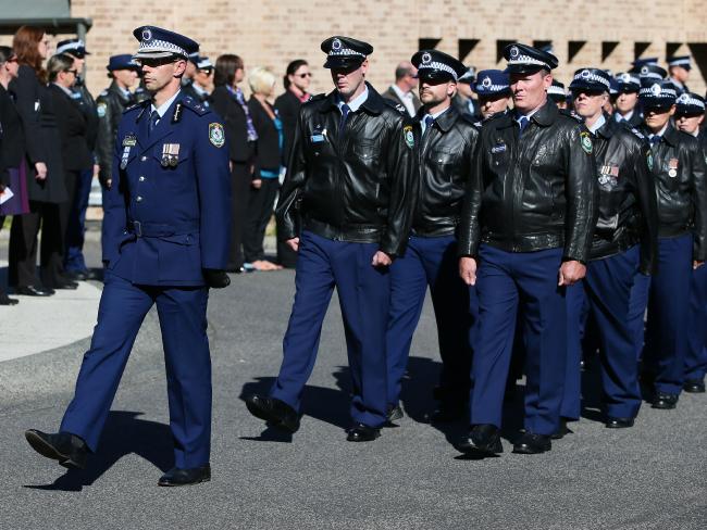 http://www.dailytelegraph.com.au/newslocal/central-coast/tributes-flow-for-courageous-lung-cancer-victim-sergeant-tara-mclaughlin/news-story/73290762d9f1aa178b04b90422ab8548 NSW Police officers march at the Terrigal service. Picture:Peter Clark