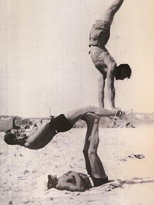Bill Harris as an acrobat (in the middle).