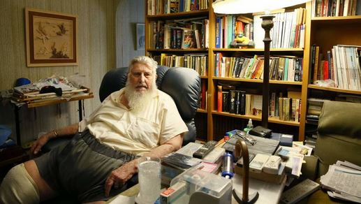 Rick Kane has light, thanks to a generator. But he is incredulous that the power is still out. Picture: Max Mason-Hubers