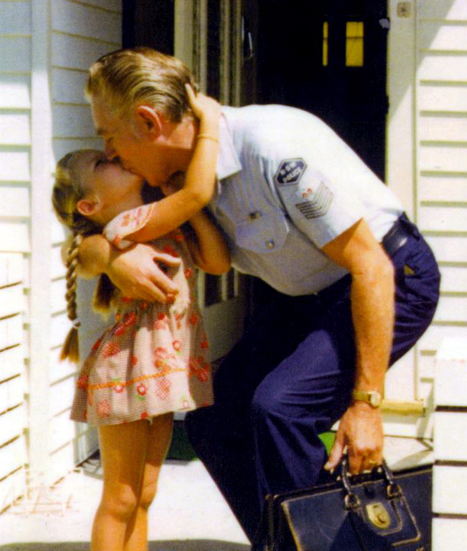 SERGEANT KEITH BEAN - KISSING HIS DAUGHTER - MELINDA.