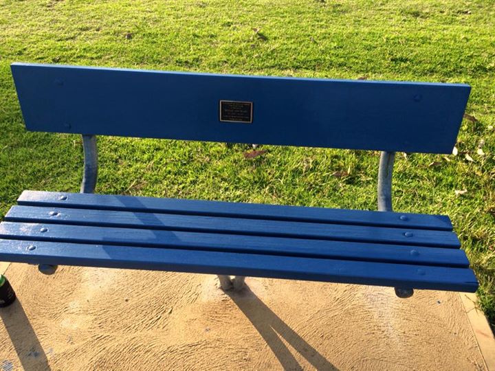 Seat dedicated to Curly Royan on the River Bank of Sussex Inlet River.