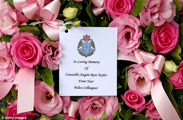 http://www.dailymail.co.uk/news/article-3507337/Constable-Angela-Rose-Taylor-killed-Russell-Street-bombing-awarded-medal.html An arrangement of pink roses was seen at the memorial service to honour the young policewoman