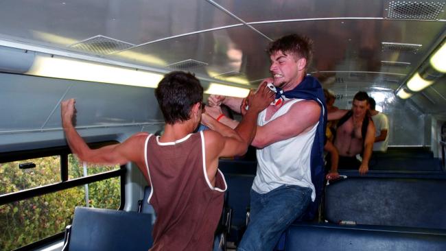 Thugs rushed into the top carriage to attack two young men waiting on the train. Picture: Craig Greenhill