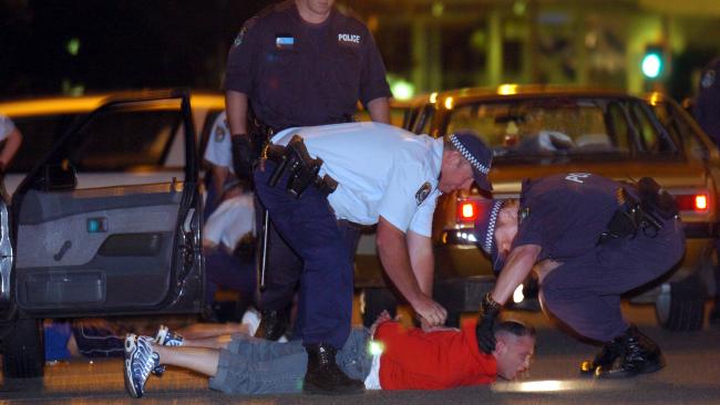 Police arrest men of who were driving into Cronulla armed in response to the train bashing. Picture: Craig Greenhill