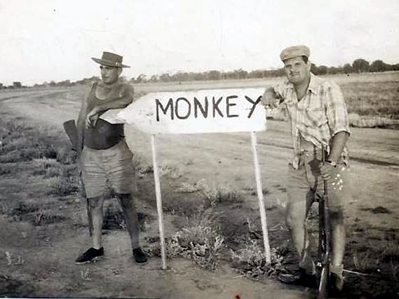 Bob Doughty on the left ( family friend ) and Ken ASTILL on right. Pig shooting around Coolah