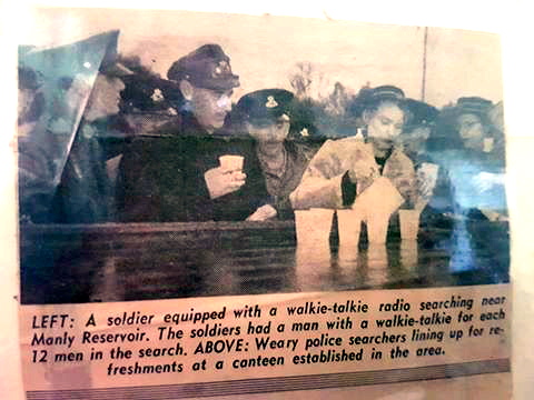 Weary Police searchers lining up for refreshments at a canteen established in the area.