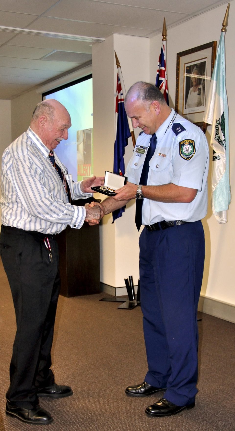 Sidney AXAM receiving his Medal.