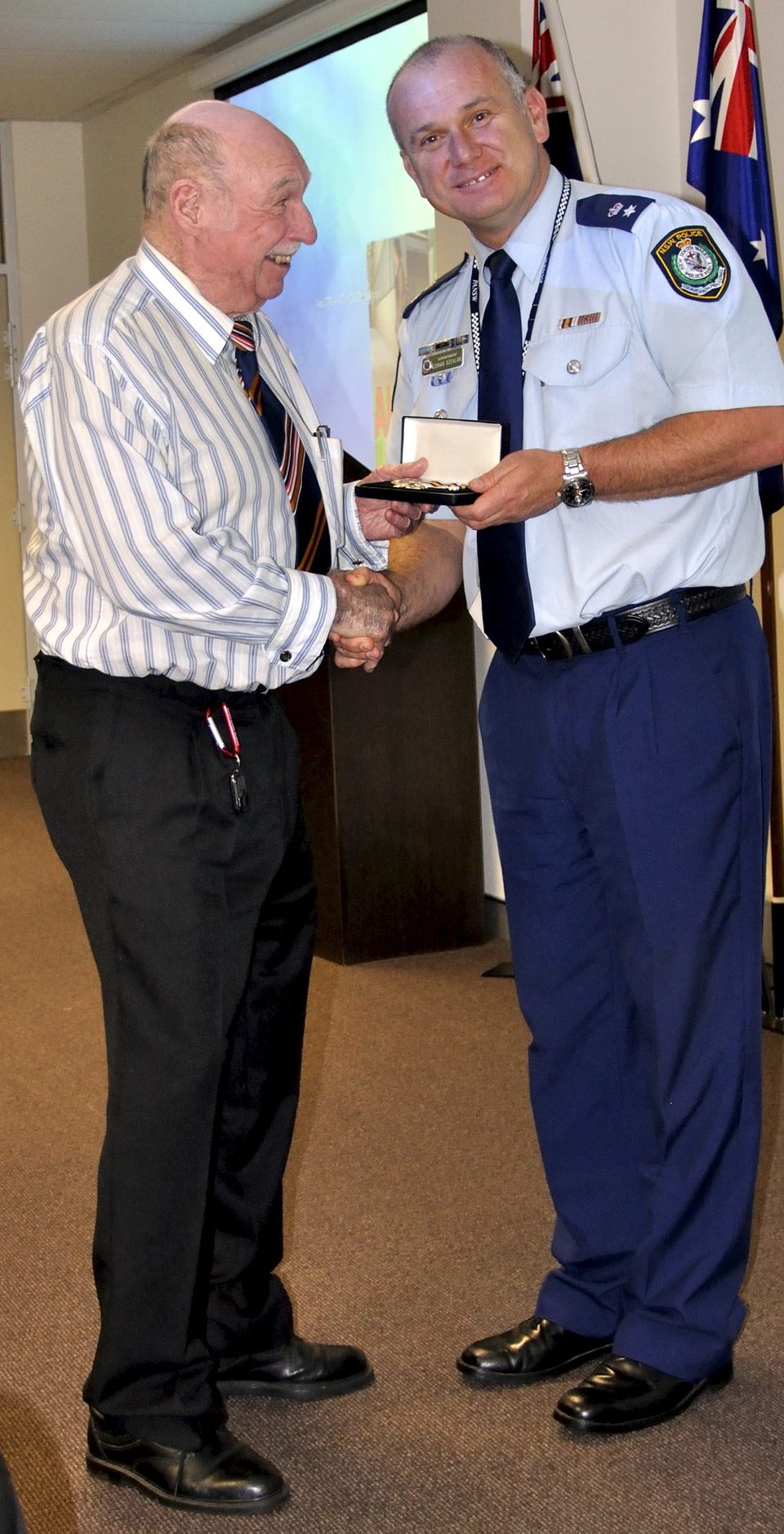 Sidney AXAM receiving his Medal.