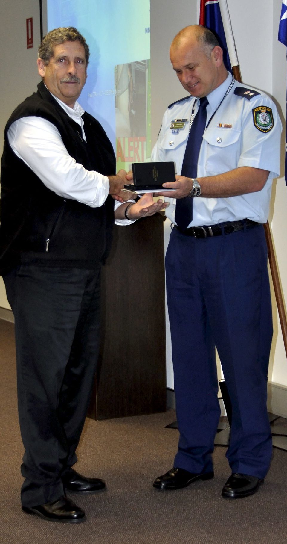 Keith BENNETT receiving his Medal.