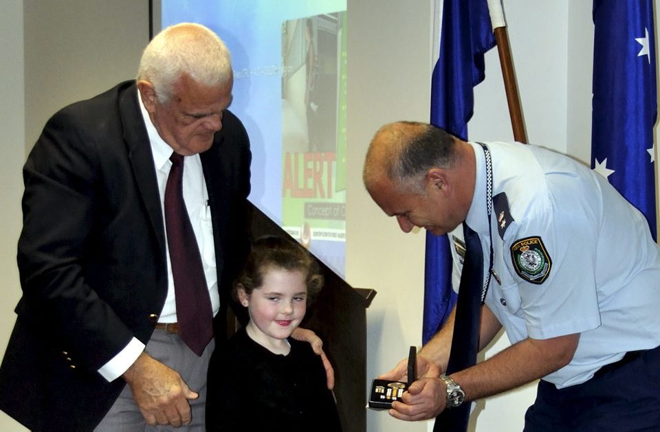 Eoin PETERS & the Granddaughter of Gail BROOKS - Rubie, accepting Gail's Medal.
