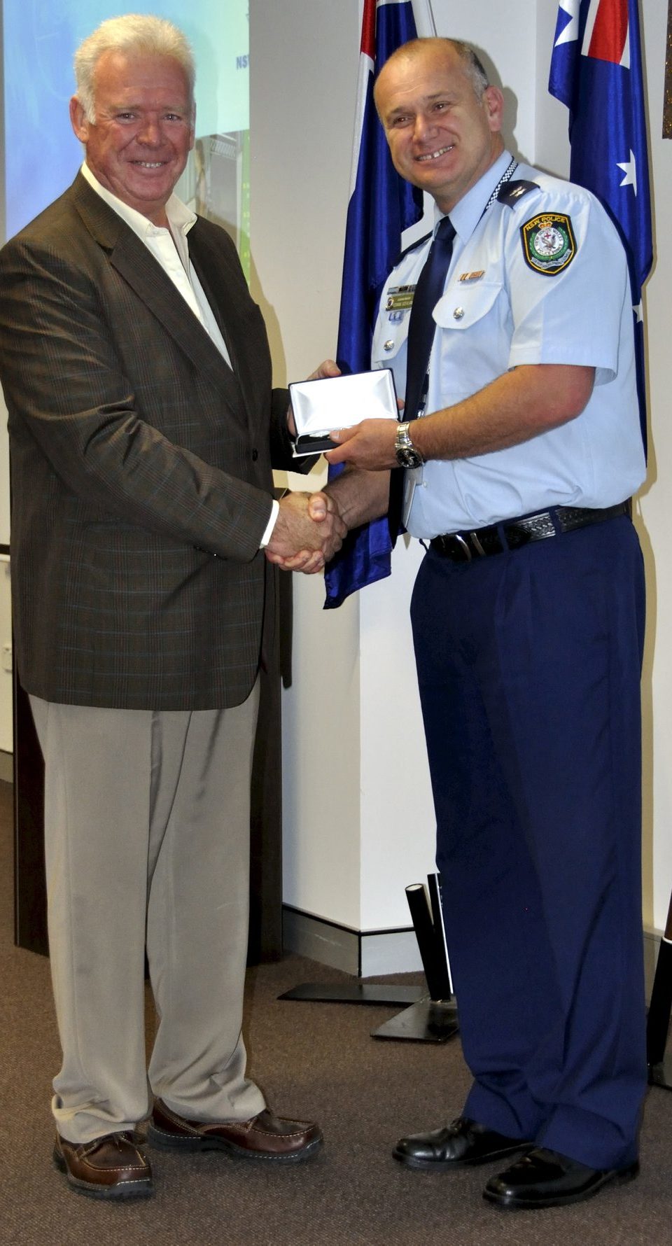 Alan BLAKE receiving his Medal.