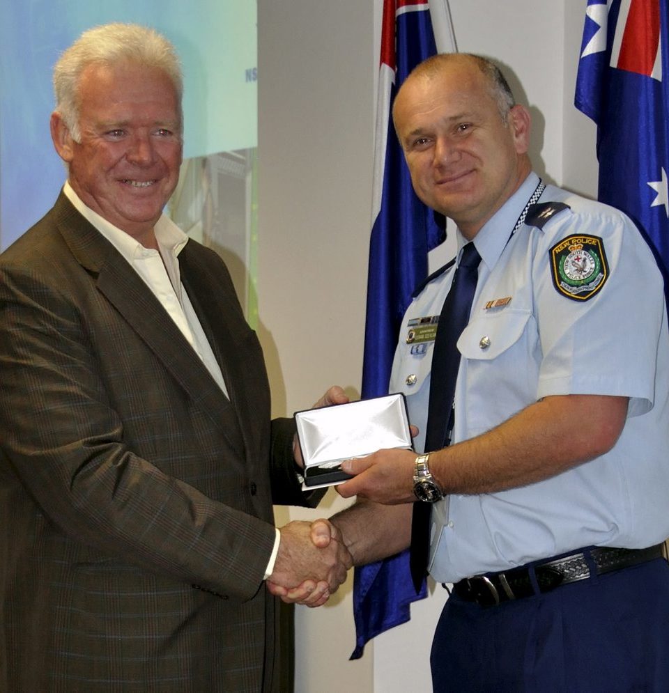 Alan BLAKE receiving his Medal.