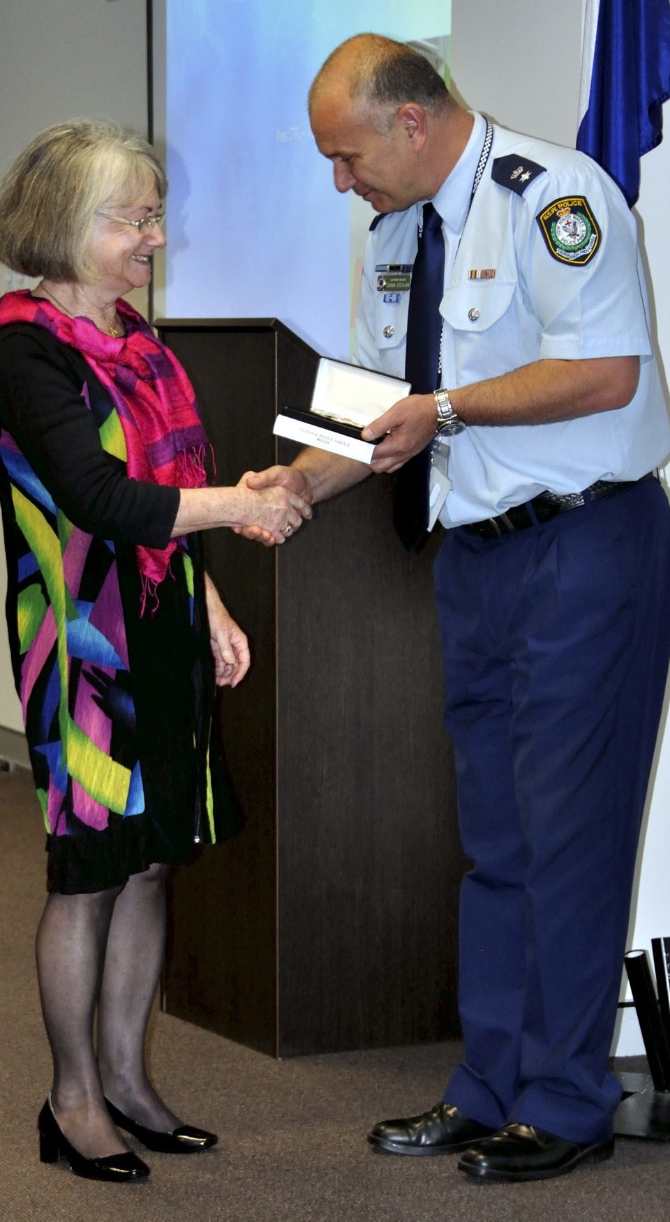 Susan GOOD - wife of John Stafford GOOD ( R.I.P. ) accepting the Medal. https://police.freom.com/john-stafford-good/