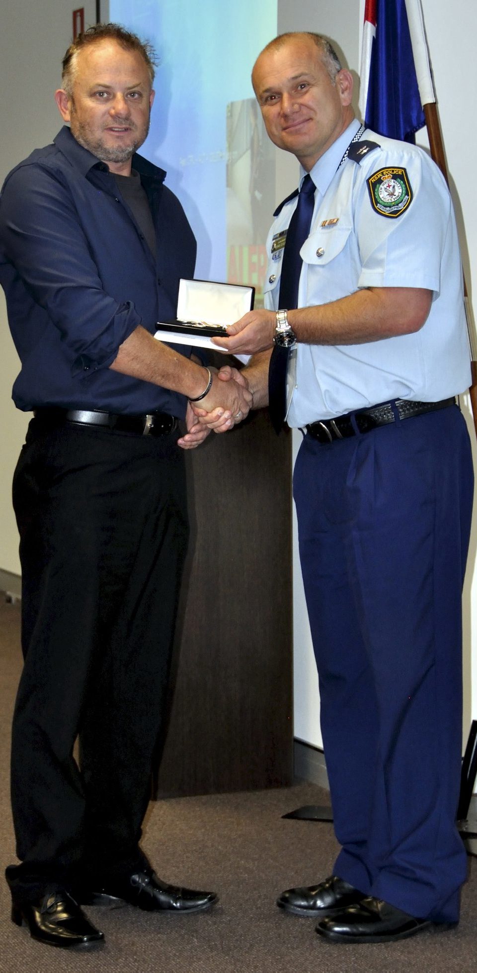 Steven REID accepting his Medal.