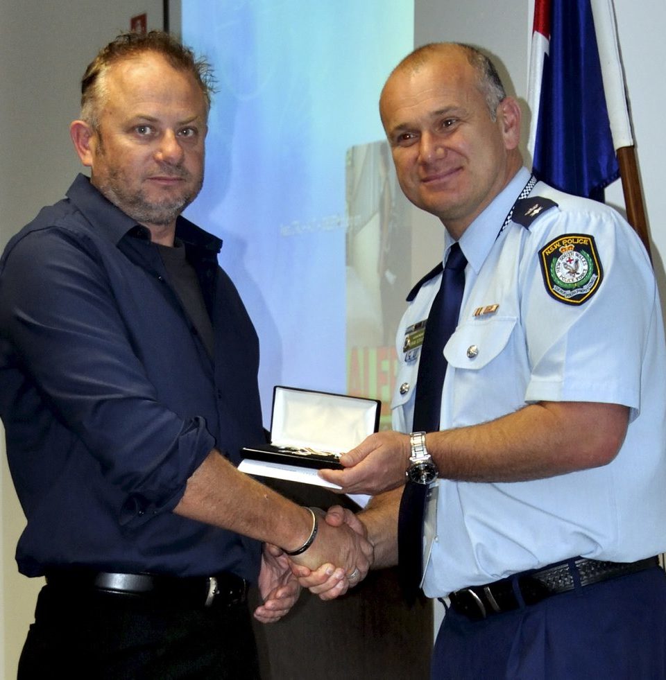 Steven REID accepting his Medal.