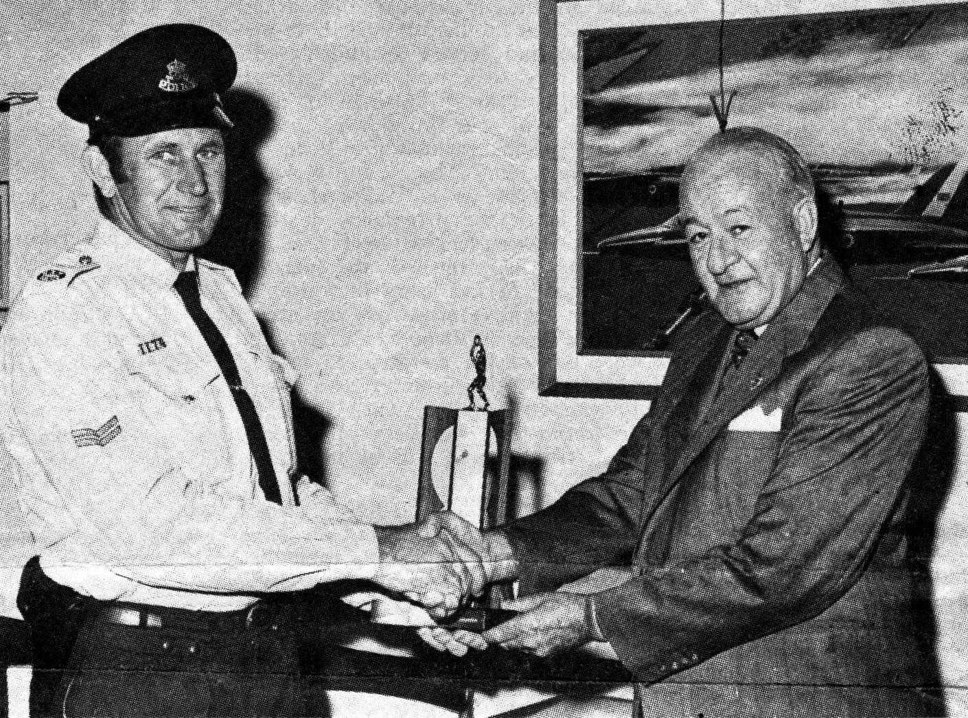 https://nswfootballhistory.com.au/ Our photograph shows Sgt Ellis Noack presenting the 1972 premiership Trophy to the then patron of the club, NSW Police Commissioner, Fred Hanson.
