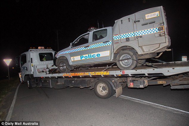 http://www.dailymail.co.uk/news/article-4552100/Queensland-police-race-save-life-shot-officer.html A police vehicle is towed from the scene where Snr Const Forte was killed on Monday afternoon