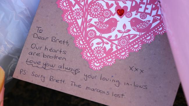 http://www.couriermail.com.au/news/queensland he-wife-of-slain-policeman-brett-forte-has-been-tormented-outside-toowoomba-police-station/news-story/75e376c3836cea1f00850b4f9559f491 Memorial located at: ?<br /> A card left by Brett Fortes in-laws. Picture: Darren England<br />