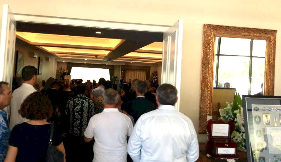 Ted Collins Entering the funeral