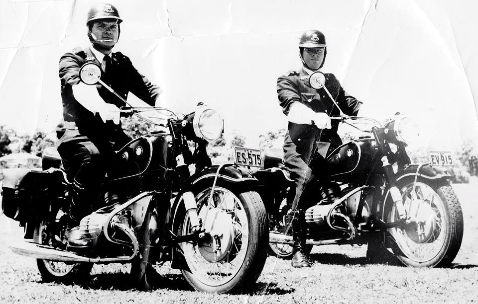 Roberts GIBBS - Retired, Resigned, Rebuffed & Recycled - Former members of the NSW Police John Burton Gibbs (right) riding Police cycle EV-915, with Noel Patmore, riding Police cycle ES-575, at Figtree Oval in 1961... the photo is captioned "Escorting Mr Maloney" to Wollongong.