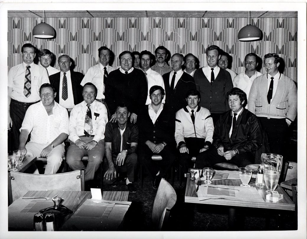 Police Association meeting at the Broken Hill Musicians Club 1977.<br /> Back Row. L to R<br /> Neil Stewart, Dave Stuart, Reg Pinkerton, ?, Ken Richards, Bob Morgan (mostly obscured) Terry Picker, Don Forsyth, Jim Brown, Barry Esling, Bryce Farlow, Allan Moseley, ?, Neville Wenban.<br /> Front Row. L to R.<br /> John Sylvester Wilkinson aka Yogi, ?, Bill Lidden aka Truthfull (?), Steven Behsmann, Garry Nowlan & Neil Scarr.<br />