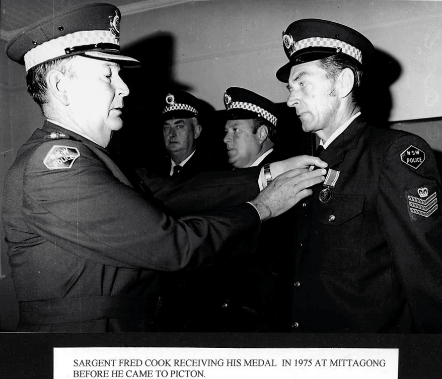 SARGENT FRED COOK RECEIVING HIS MEDAL IN 1975 AT MITTAGONG BEFORE HE CAME TO PICTON.
