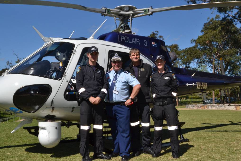 https://www.southcoastregister.com.au/story/1793187/gallery-police-open-day/ 2013: POLAIR 3: Senior crew member John Smith, NSW Police Force Inspector Steve Johnson, pilot Allan Gary and assistant crew Kate Howe at the NSW Police Force open day at Nowra Anglican College on Saturday.