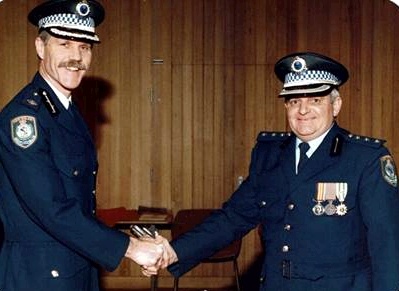 Dave MORRIS Geoffrey Alan HOLLIS receiving the 1st Clasp to the National Medal from Assistant Commissioner Jeff Jarrett in mid 1990's