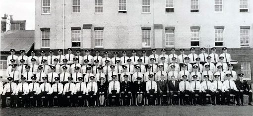 Left to right - back row - Mike Stephens, Rod Fulham, Paul McGowan, John Imeson, Merv Braithwaite, Kevin Mongton, Barry Luckie, Brian Rowley, John Baker, Brian Borthwick, Barry Cooper, John Hayes, Tony Madigan, Bruce Spencer, Barry Lawson, Bernie Lee, Roy Fry (partly obscured by Ian Robb standing at end of middle row), Roy Leabeater (Instructor).<br /> Middle row - Ross Goodwin, Brian McIlvenna, Leo Gately, Gordon Doyle, Harvey Juergens, Wally Lark, Helen Clark ( later Magnus ), Ida Luke, Fred Sewell, Ron Blake, Terry Lester, Tom Powick, Ian Robb (standing).<br /> Front row - Trevor Neill, Les Wyatt, Bob Drooger, Warren Taylor, Brian Johnson, Brian Warwick, Les Miller, Bill Dent, Clem Long, Lloyd Taylor, Len DeAudney, Col Bell.<br />