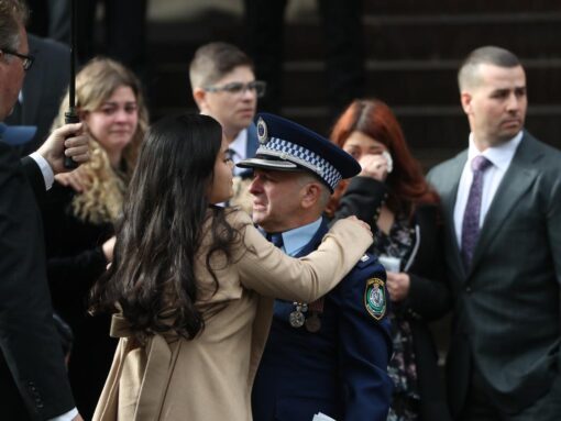 Aaron Vidals fiancee Jessica Loh and father Chief Inspector David Vidal embrace at the constables funeral at St Mary's Cathedral. Picture: Rohan Kelly