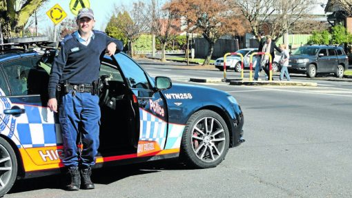 https://www.centralwesterndaily.com.au/story/2394399/motoring-madness-drivers-ignore-school-zone-speed-limits/ WARNING SIREN: Orange Highway Patrol Leading Senior Constable Wes Bush and Richard and Sim Madigan (crossing) are calling on drivers to slow down in school zones to protect children like Catherine McAuley Catholic Primary School student Henry Madigan. Photo: OLIVIA SARGENT 0703oscrossing
