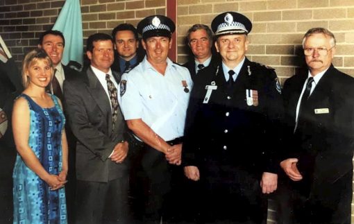 Doctor Michael Anthony RAYMOND AM - Standing on far right.